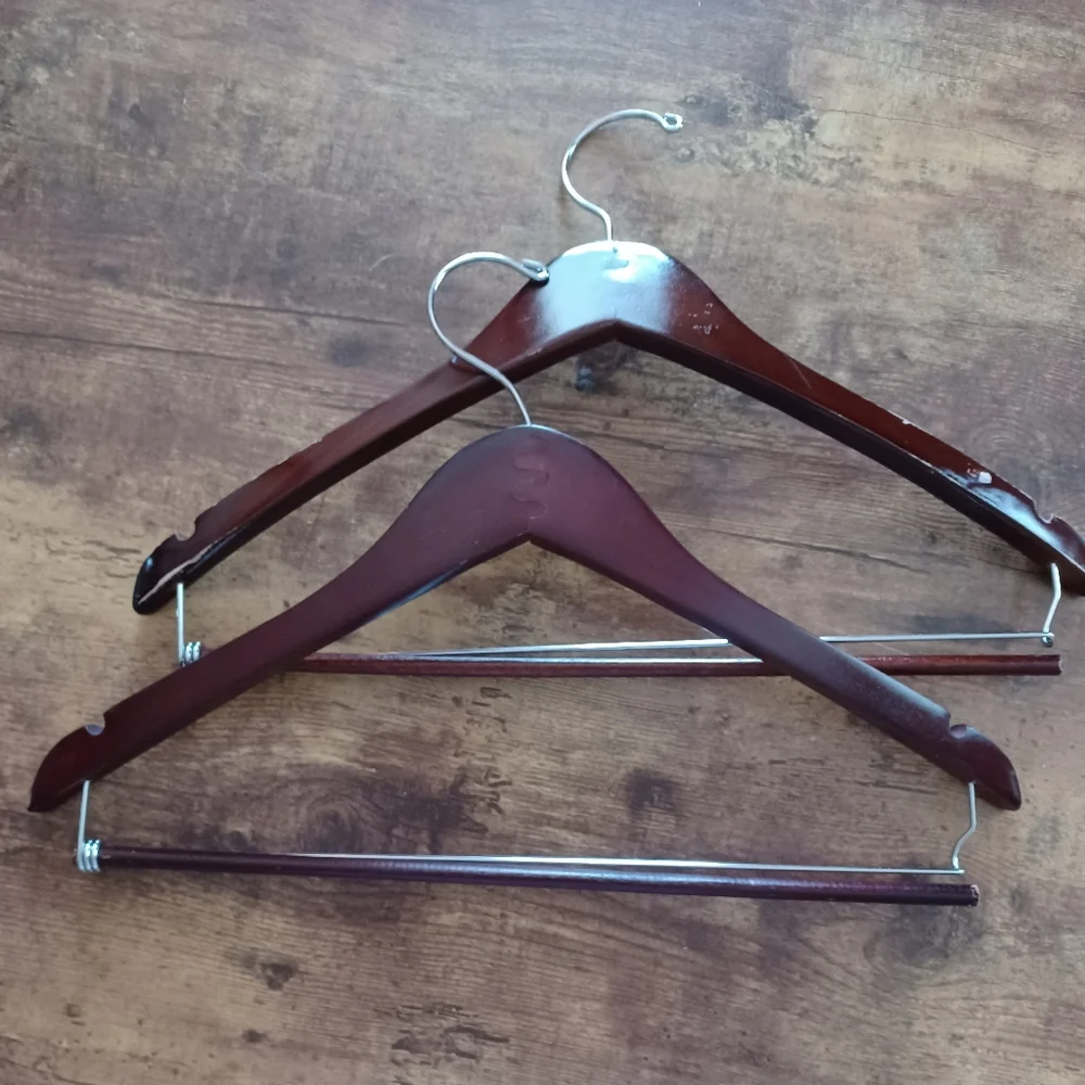 2 wooden coat hangers